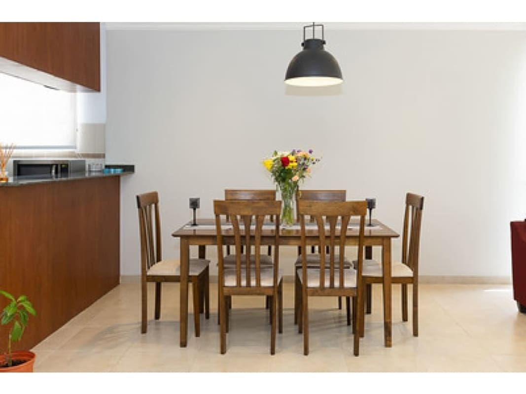 Bedroom with wood floors large window skyline view PH Fairmont Plaza Panama