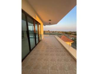 Bright open living room with tile floors and Pacific Ocean views at PH Las Olas II Vistamar Panama