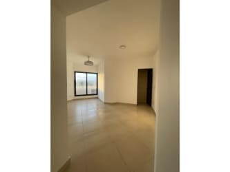 Contemporary kitchen with granite countertops and stainless appliances in PH Las Olas II San Carlos Panama