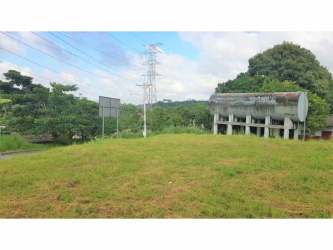 Vacant triangular commercial lot beside road in Mañanitas Panama City