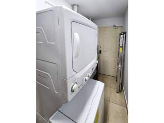 Modern bathroom with glass shower and tile walls in PH Paraiso Village Coronado Panama