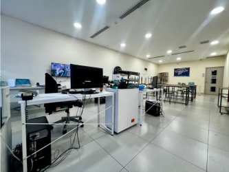 Well lit commercial office with desks and technology Midtown Plaza commercial unit Panama City