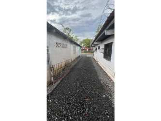 Commercial courtyard with gravel path and fencing Costa Verde La Chorrera Panama