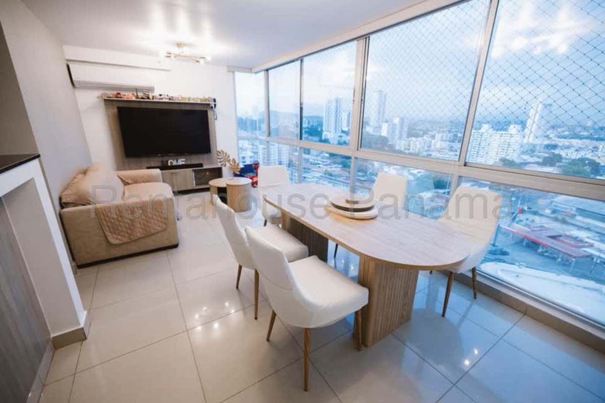 Living room with large windows city view Coral Tower Carrasquilla Panama