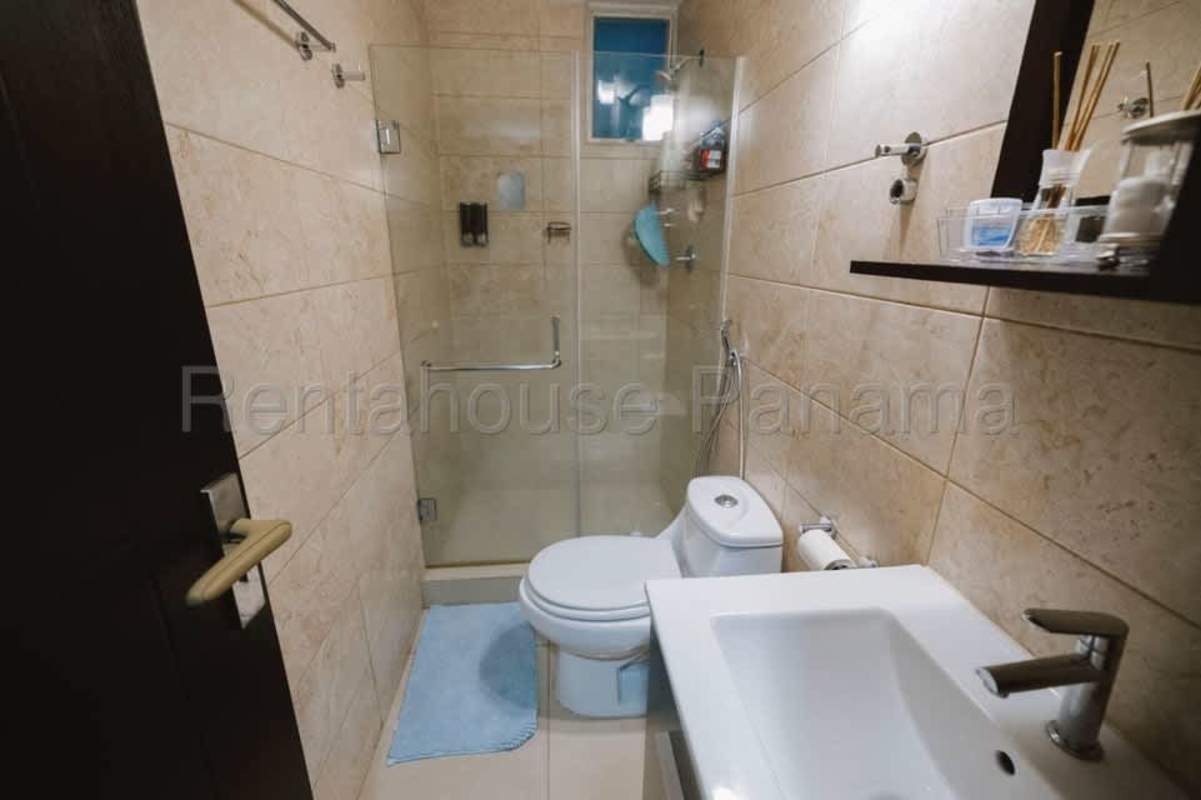 Modern bathroom with glass shower Coral Tower apartment Panama City