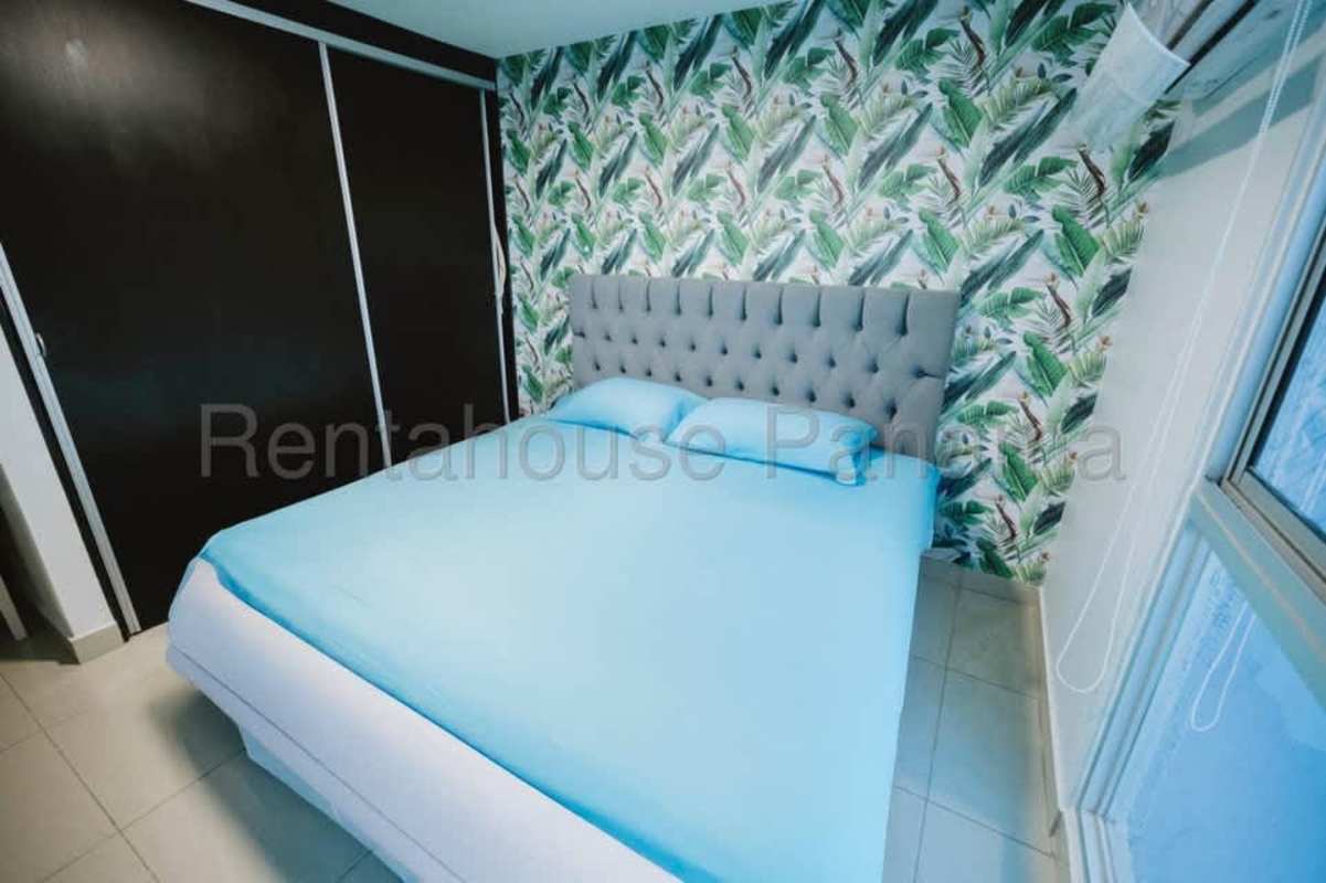 Cozy bedroom with accent wall window Coral Tower Carrasquilla Panama