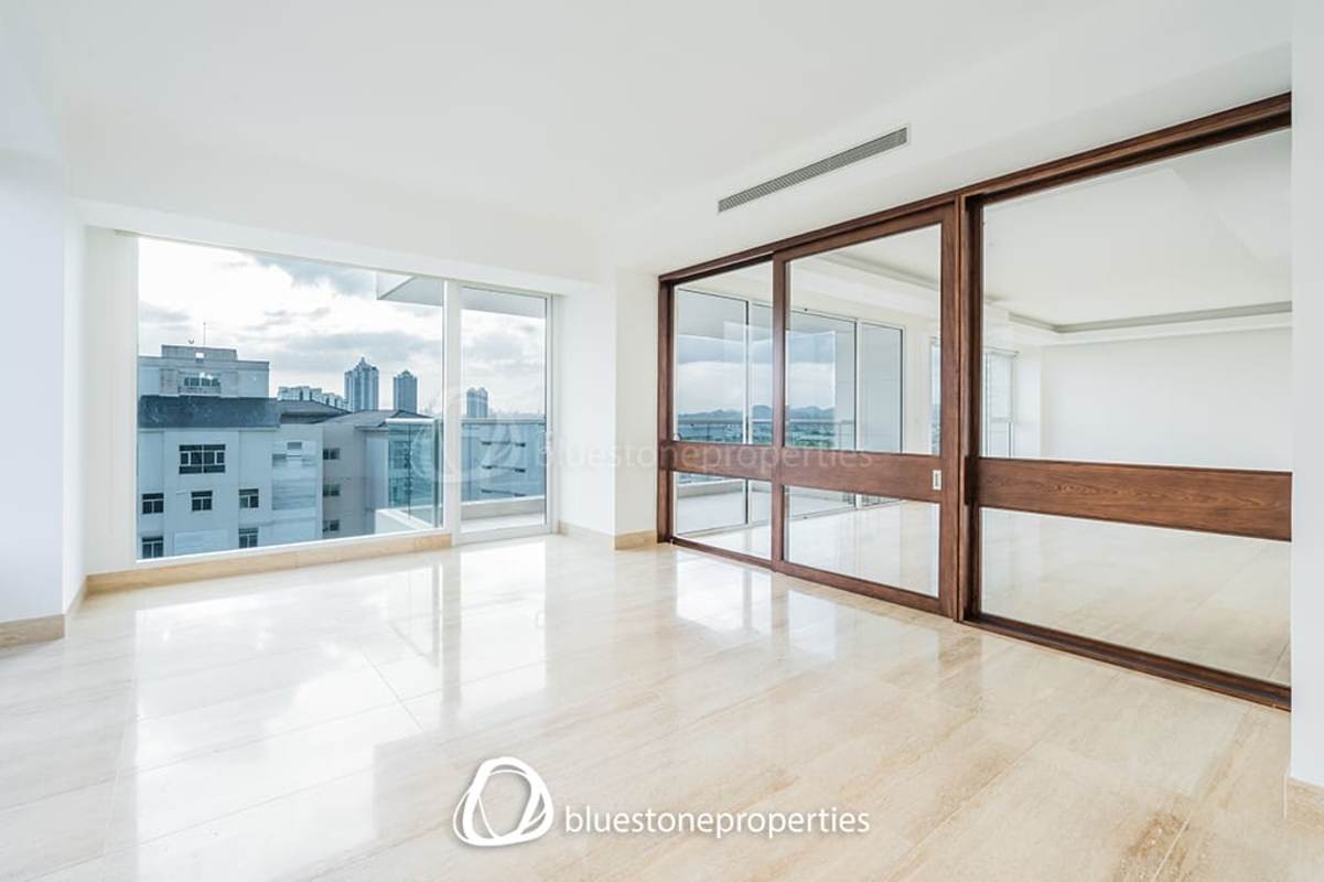 Contemporary kitchen with center island, appliances, wood cabinetry at Santa Maria Panama