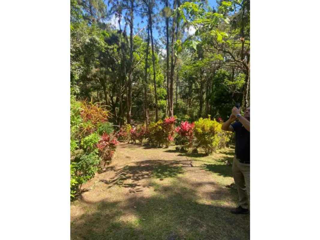Rustic mountain house with A-frame roof, garden, and porch in Cerro Azul Nevados de Cerro Azul Panama
