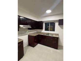 Spacious outdoor terrace and private swimming pool at Davis residence in Colón Panama