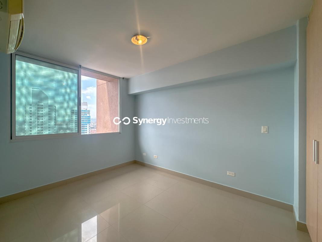 Secondary bedroom with city views and ample closet space Costa del Este