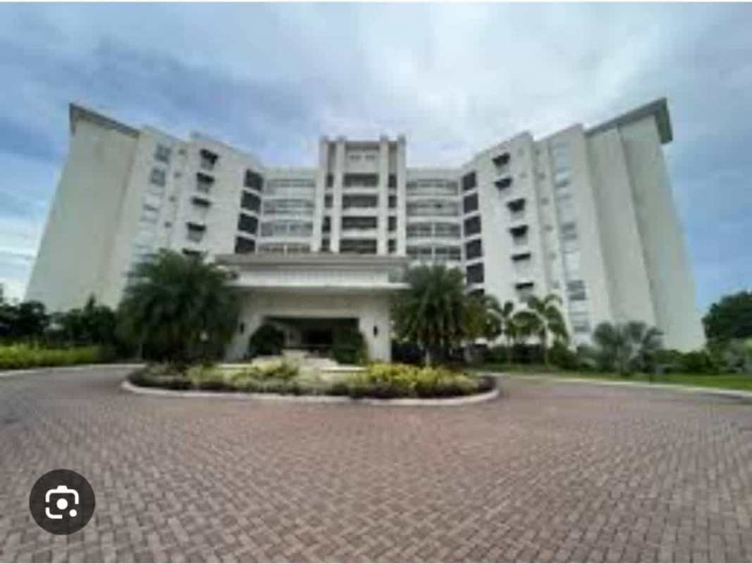 Resort style pool with artificial beach and landscaping at The Reserve Santa Maria Panama