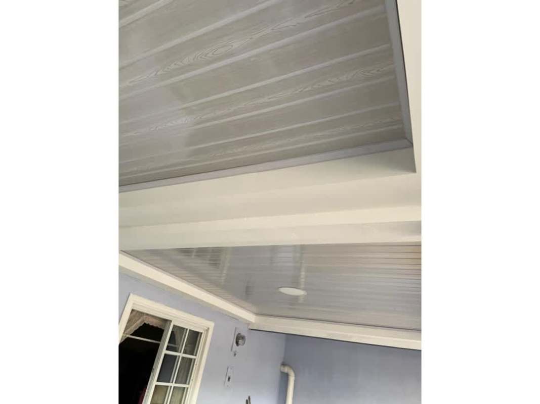 Covered terrace area with ceiling panels and window at house Las Mañanitas Panama