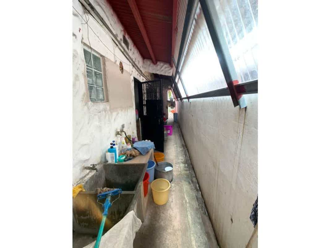 Spacious living and dining room with tile floors and ceiling fan Villa de las Fuentes Panama house