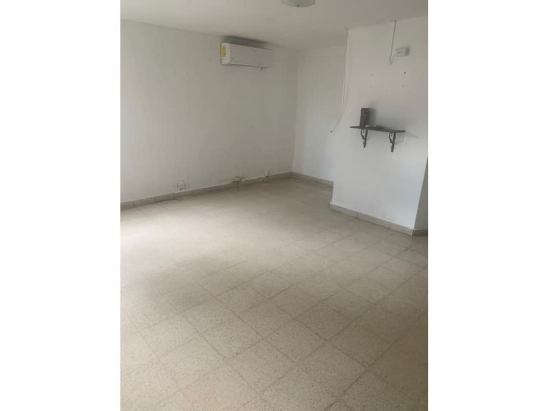 Bathroom with frosted glass shower, white vanity and tiled walls PH Fiesta Obarrio Panama