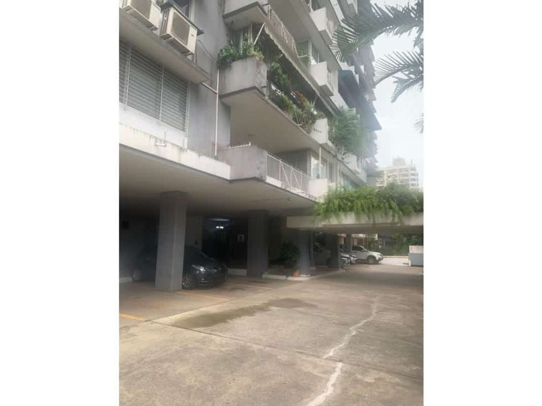 Kitchen featuring granite countertop, retro patterned tile backsplash, windows with blinds in PH Fiesta Obarrio Panama