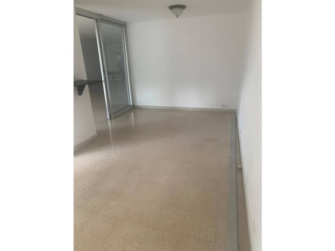 Multi-story apartment tower with balconies and covered parking PH Fiesta Obarrio Panama