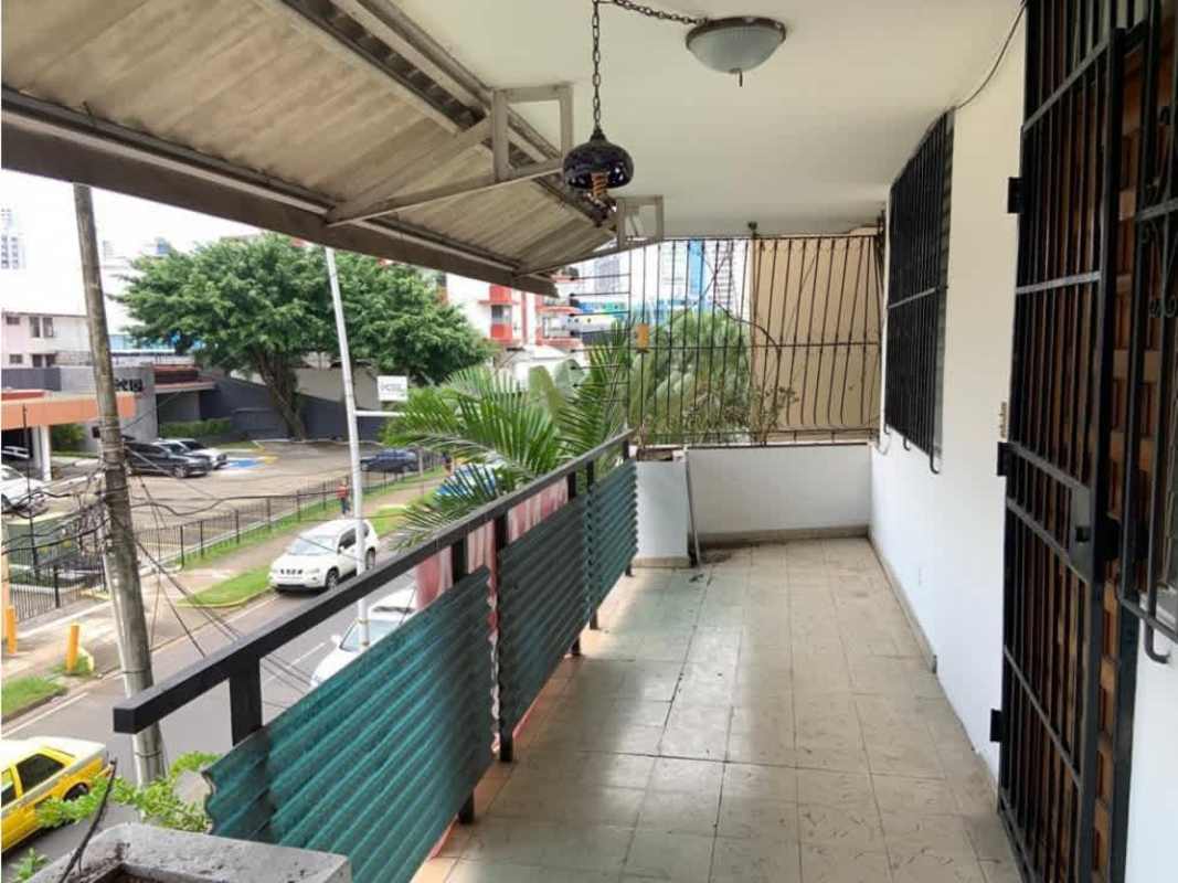 Functional kitchen with cabinets and gas stove in Obarrio apartment