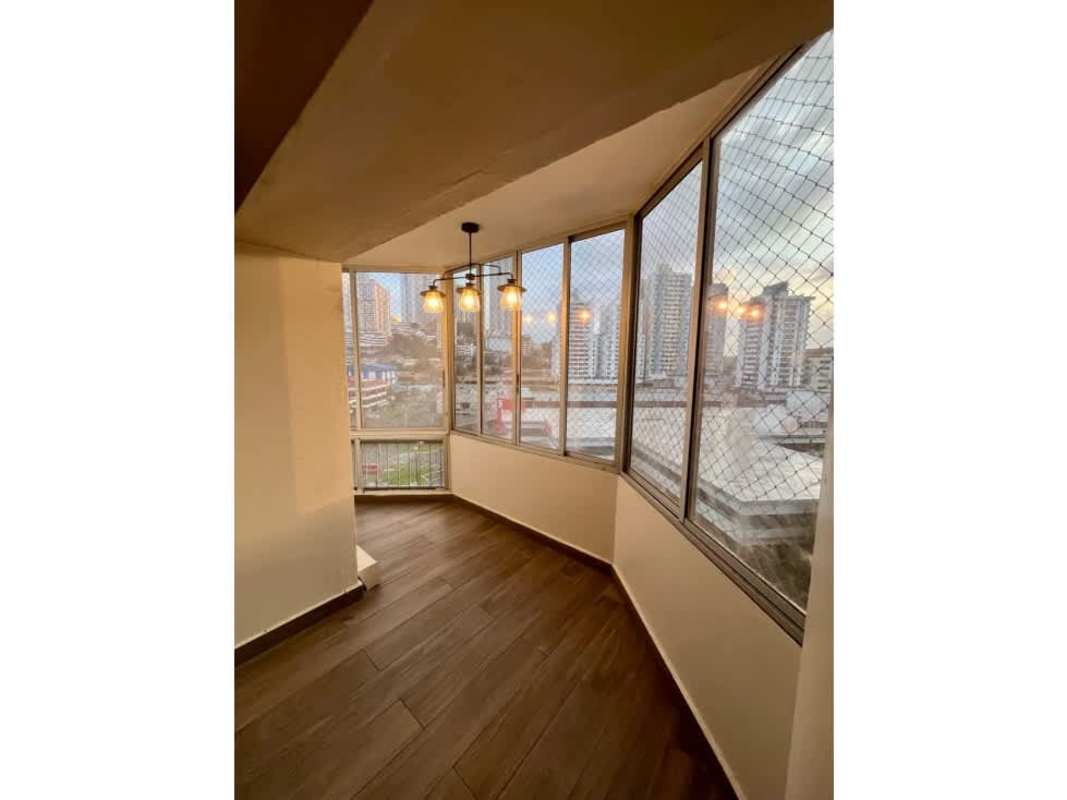 Enclosed balcony with windows and tile floors overlooking El Dorado City Panama apartment for sale