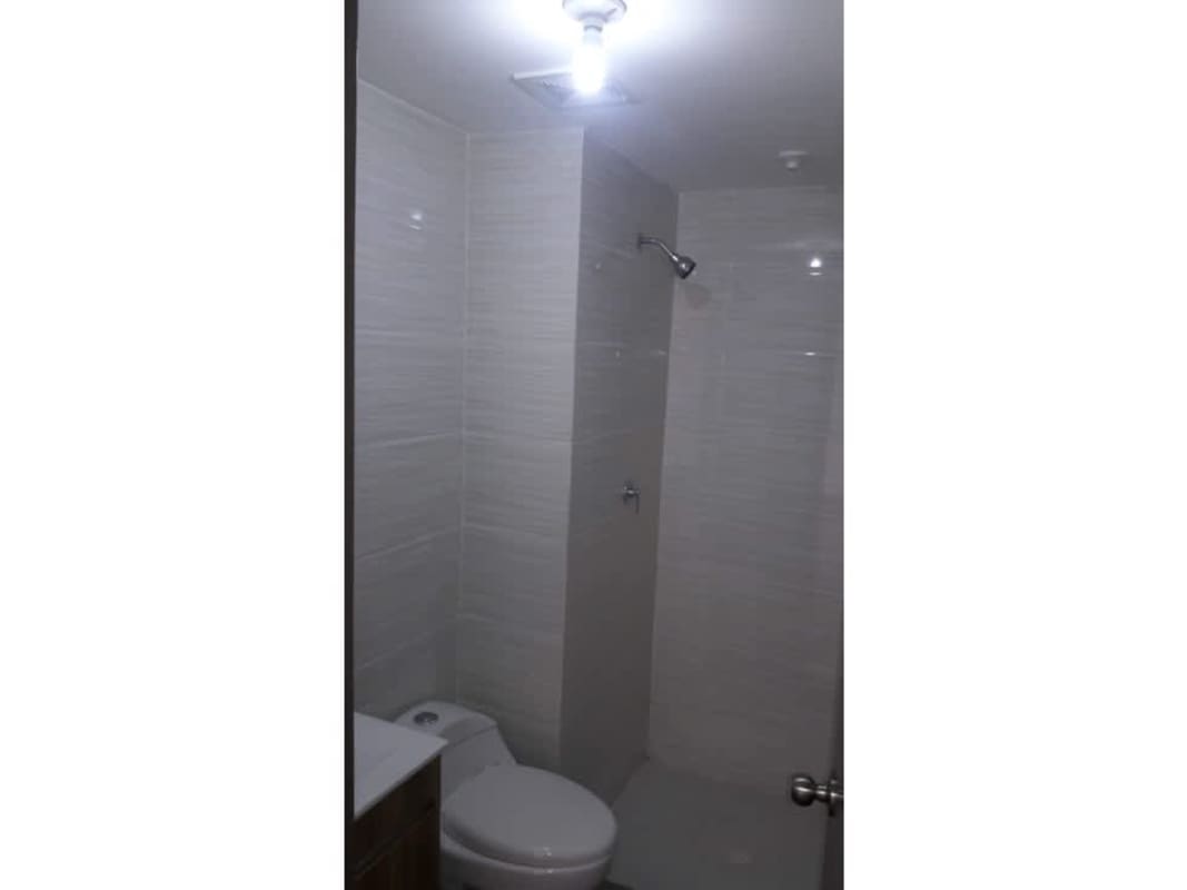 Bedroom space with window providing natural light in Ciudad Radial PH 507 Panama