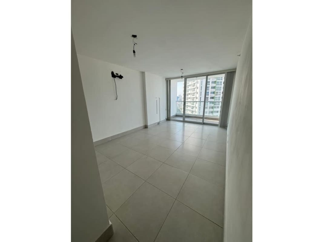 Modern lobby with glass walls and seating at PH Vivendi Green Edison Park Panama City