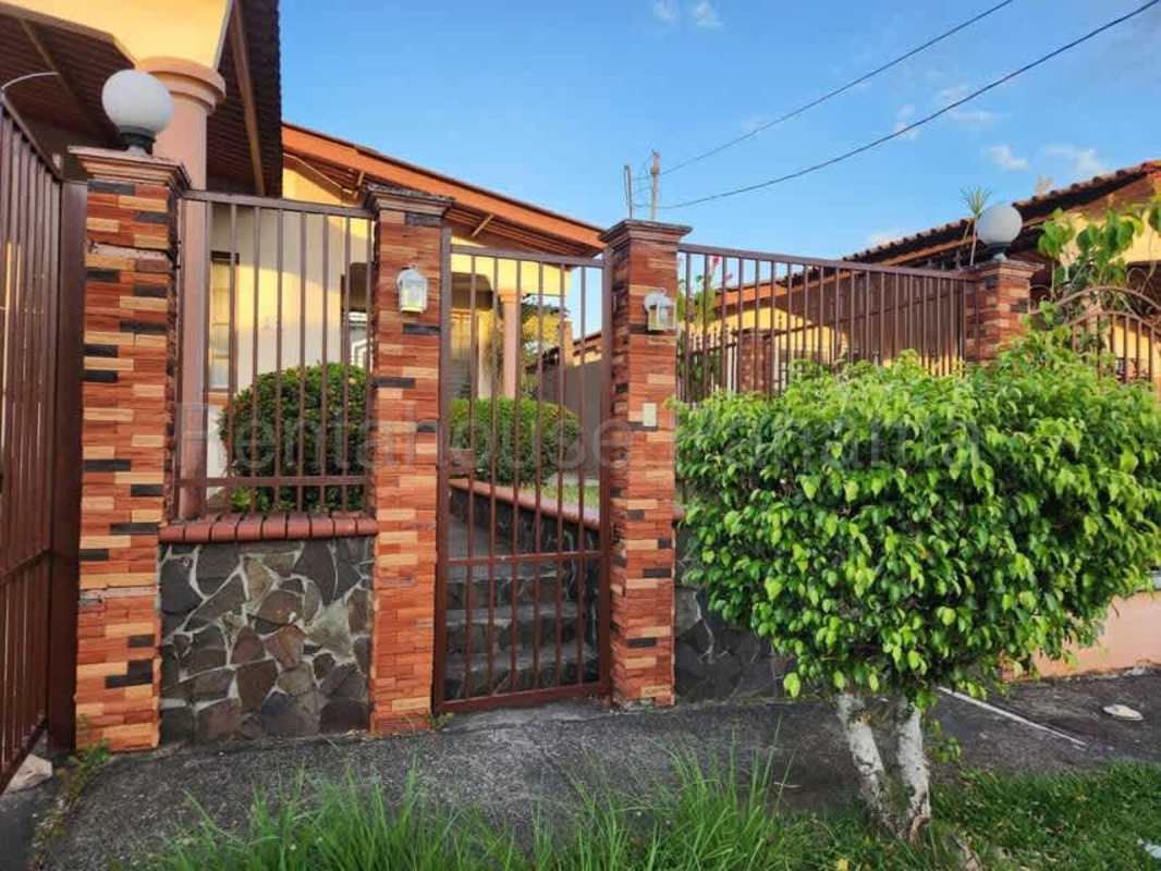 Spacious living and dining area with tiled floors in Brisas del Golf Panama City house