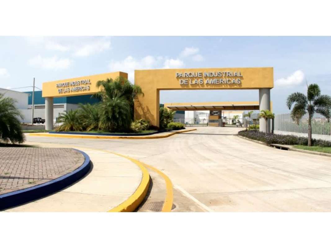 Entrance of Parque Industrial Las Americas with security booth and gardens Tocumen Panama