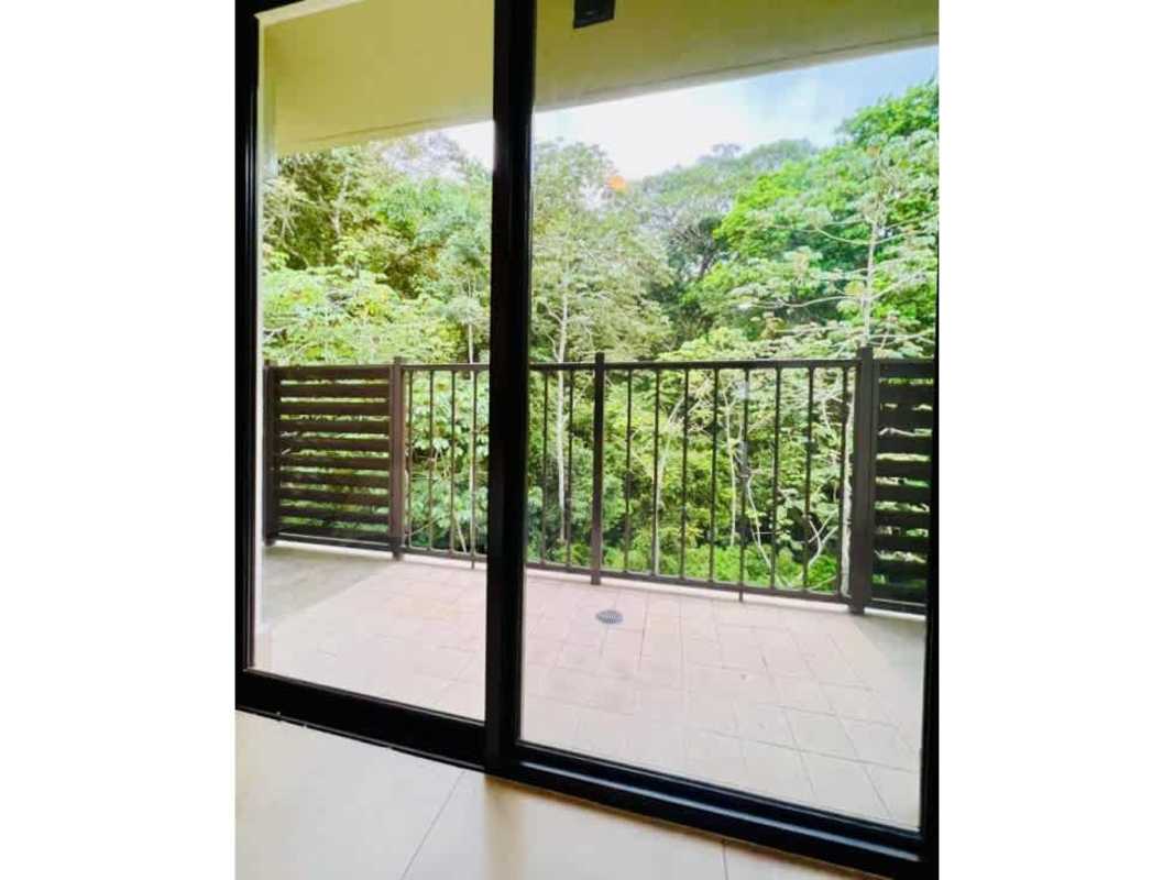 Panoramic forest and garden views from spacious balcony in Embassy Village Panama