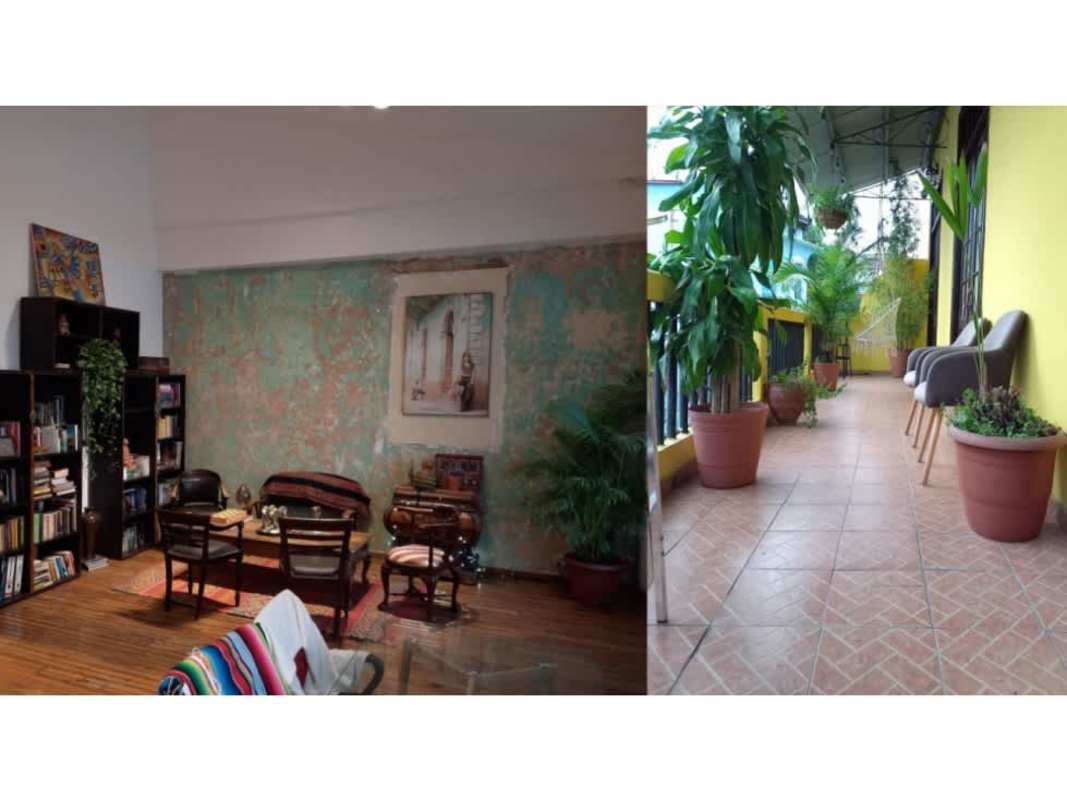 Vintage colonial interior with balcony overlooking Casco Viejo streetscape in Casa Catalina Panama