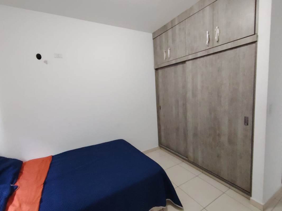 Modern kitchen in PH Sabana Tower with granite countertops and white cabinetry Carrasquilla Panama City