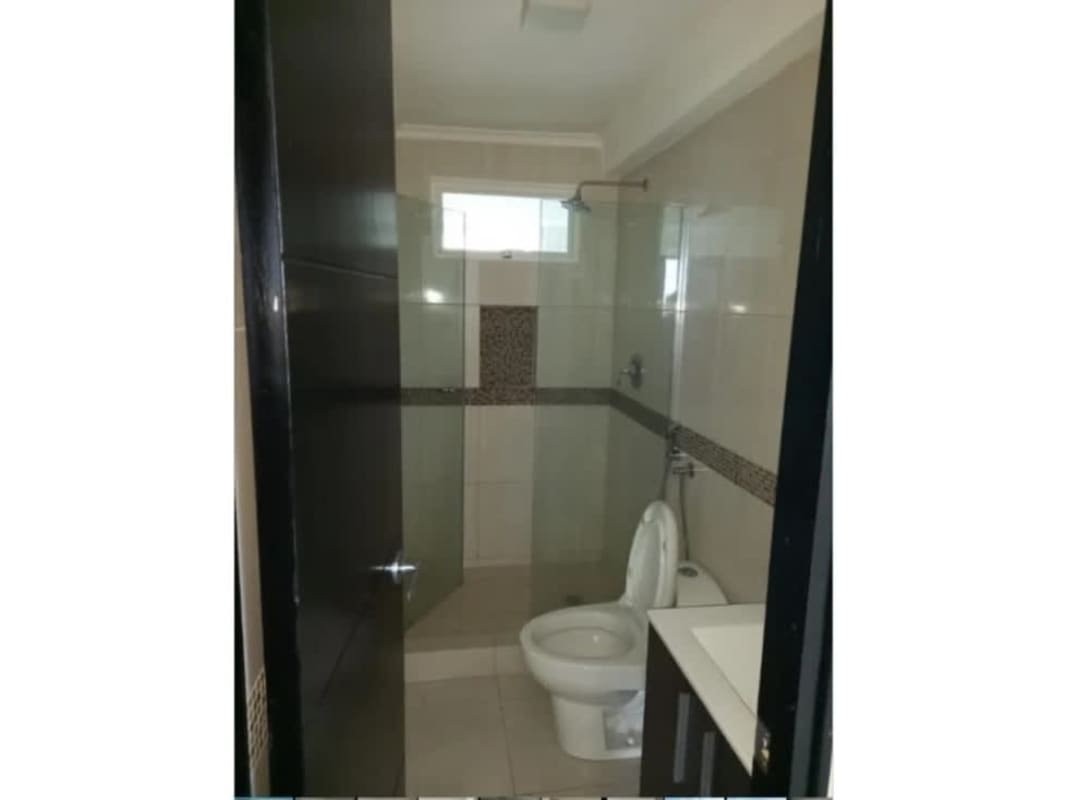 Contemporary bathroom with tiled walls and glass shower PH El Mare 600 Panama