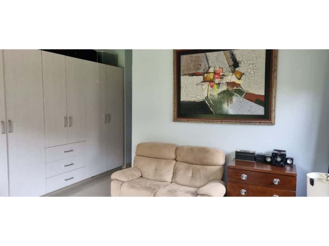 Spacious backyard terrace with outdoor seating and green garden at PH Green Village Las Cumbres Panama