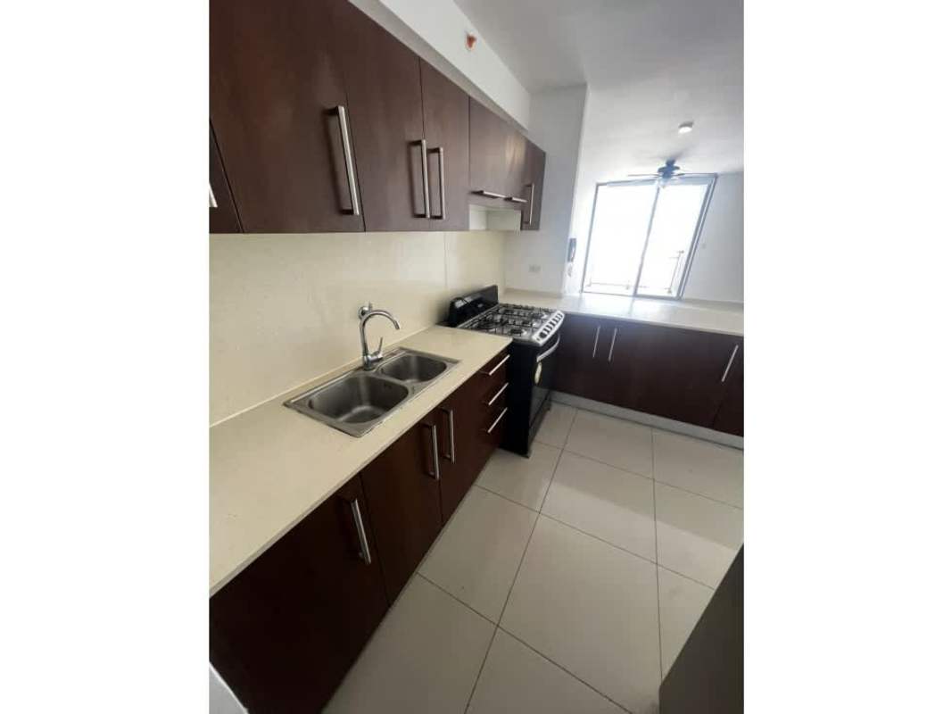 Contemporary apartment kitchen with granite countertops and gas stove in PH Luma Panama City