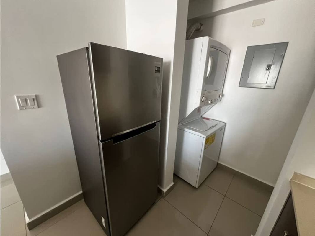 Laundry and utility area with washer hookup in PH Luma Panama City apartment
