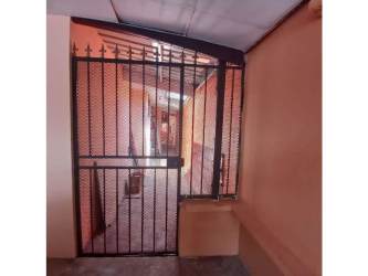 Spacious bedroom with tiled floor and natural lighting in Altos de San Gabriel Arraijan Panama