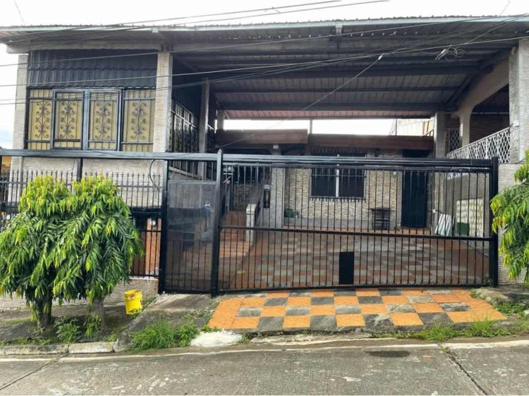Exterior gated house with covered parking stone facade in Cerro Viento near Metro Panama