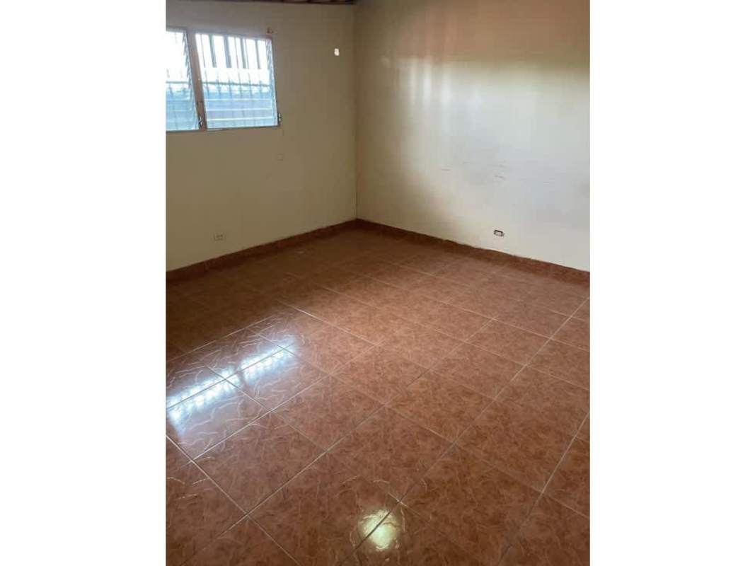 Bedroom tiled floor security-bar windows neutral colors Cerro Viento Panama