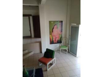 Kitchen with natural light, white cabinetry, gas cooktop in Playa Corona beachfront residential house Panama