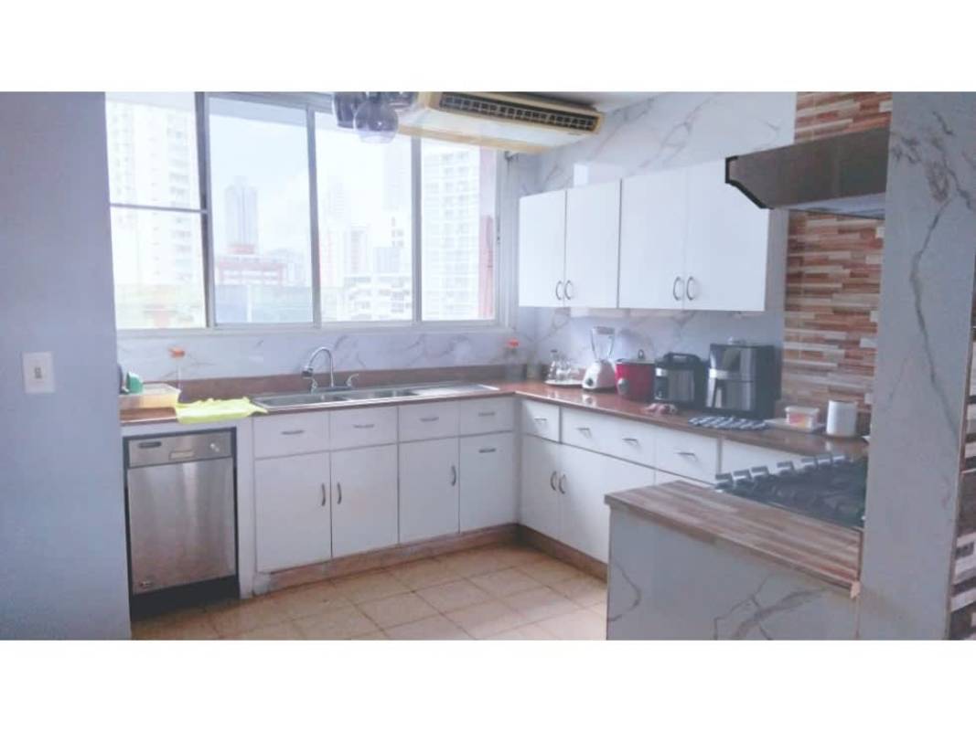 Bedroom featuring wooden dresser, fan, large window with curtains in PH Elege El Carmen