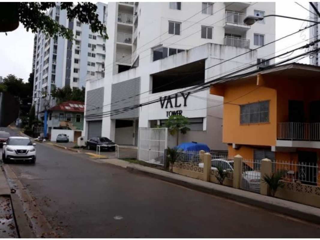 Contemporary bathroom with beige tiles pedestal sink toilet glass shelf PH Valy Tower Panama