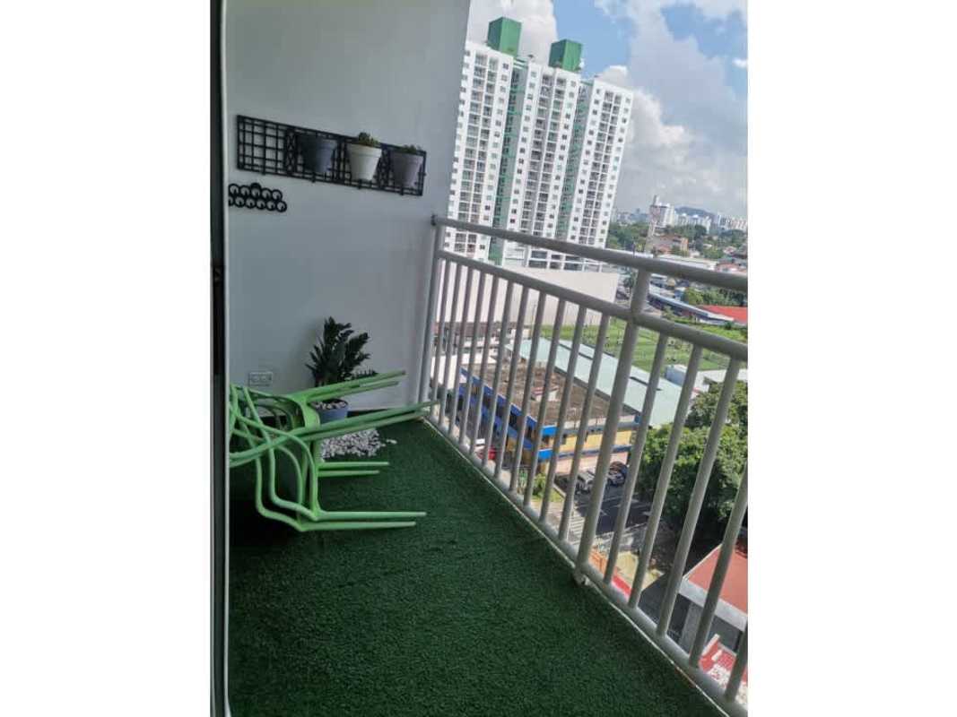 Street view showing PH Valy Tower high-rise residential building balconies in Carrasquilla Panama