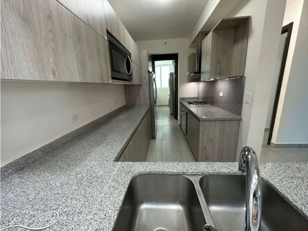 Kitchen with granite countertops and stainless appliances in PH Asia Costa del Este Panama