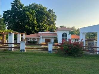 Open plan living area with tiled floors and panoramic countryside views Hacienda Santa Catalina Panama