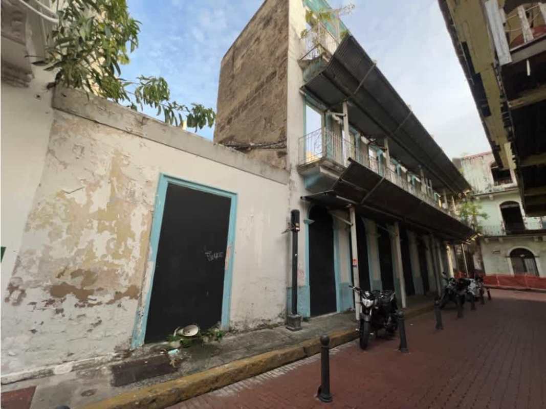 Historic building with ornate balconies and arched entrances colonial Casco Viejo Panama