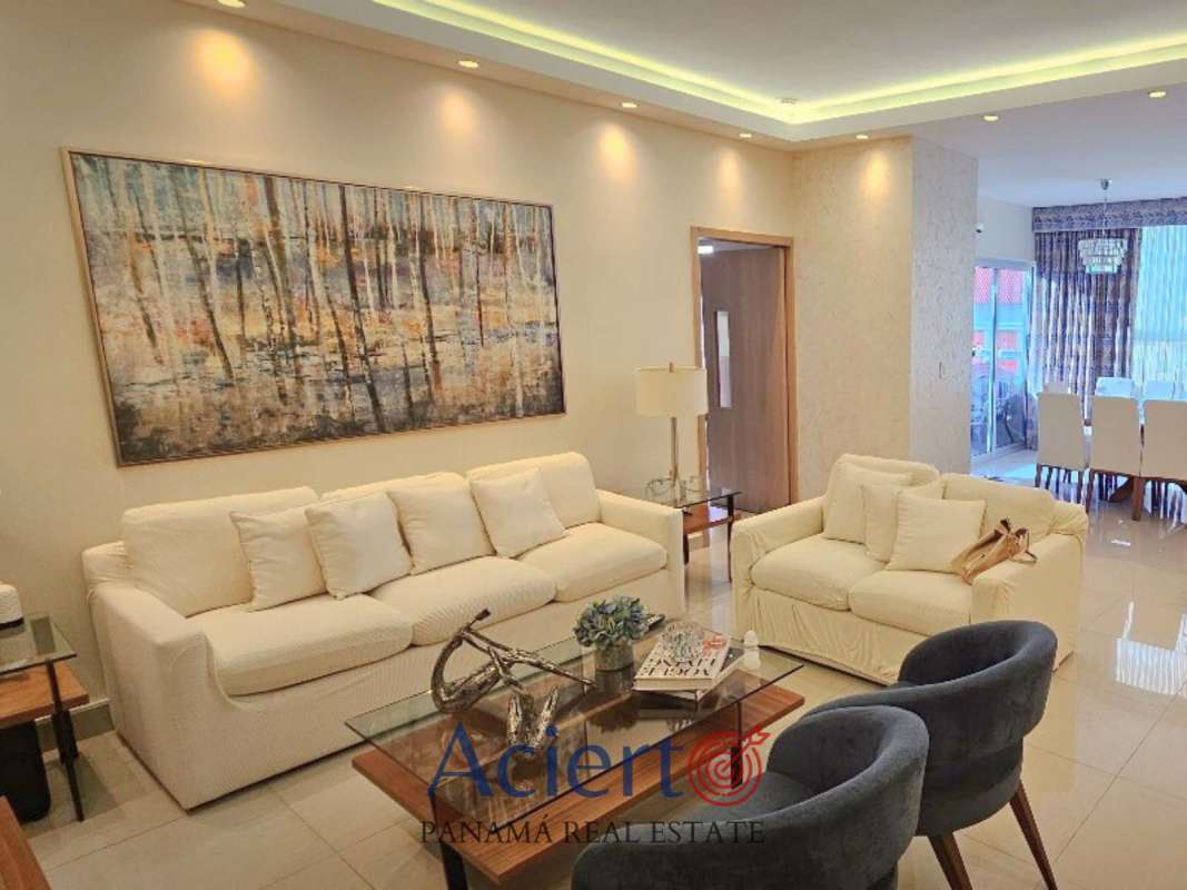 Modern dining area in apartment with balcony and city views at PH Coral Tower San Francisco Panama