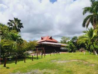 Rustic countertop bar and kitchen inside beachfront restaurant in Farallón Panama