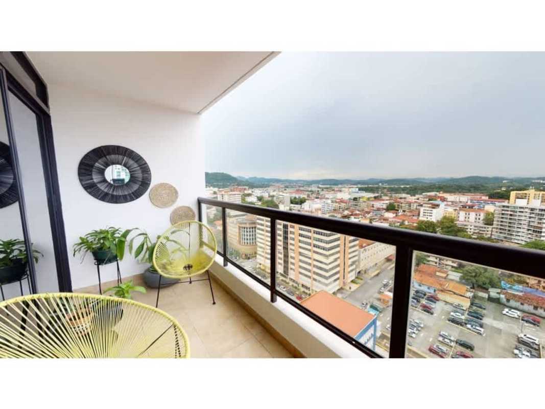 Modern kitchen with dual basin sink, cabinets and tile backsplash in PH Balboa Bay Panama City