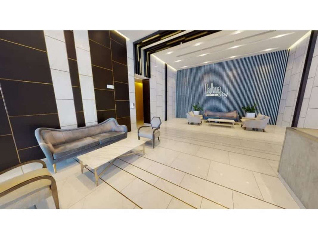 Modern event room with ping pong table and panoramic windows at PH Balboa Bay Panama