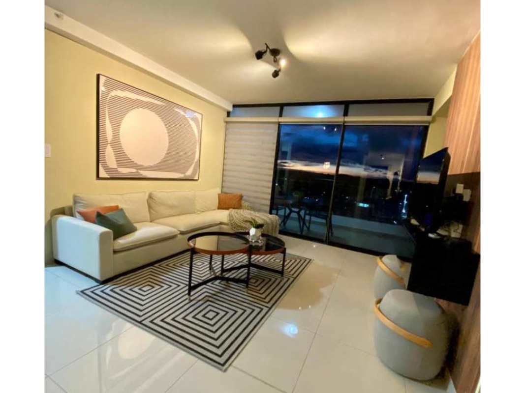 Open living dining area with sea view balcony PH Balboa Bay Apartment Panama City