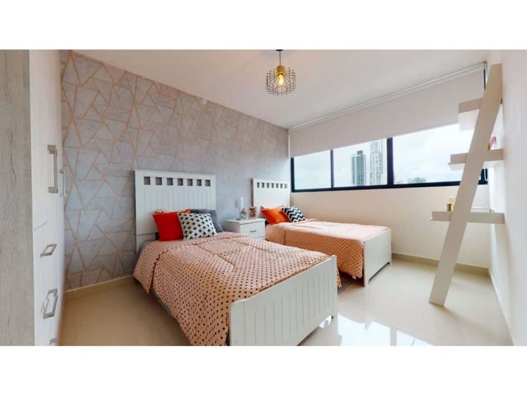 Modern condominium gym with cardio equipment and bay views in PH Balboa Bay Panama