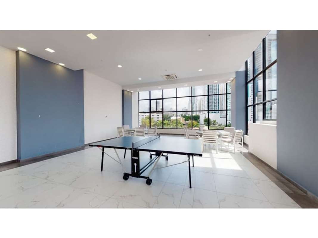 Elegant lobby with modern furnishings and reception at PH Balboa Bay in Panama City